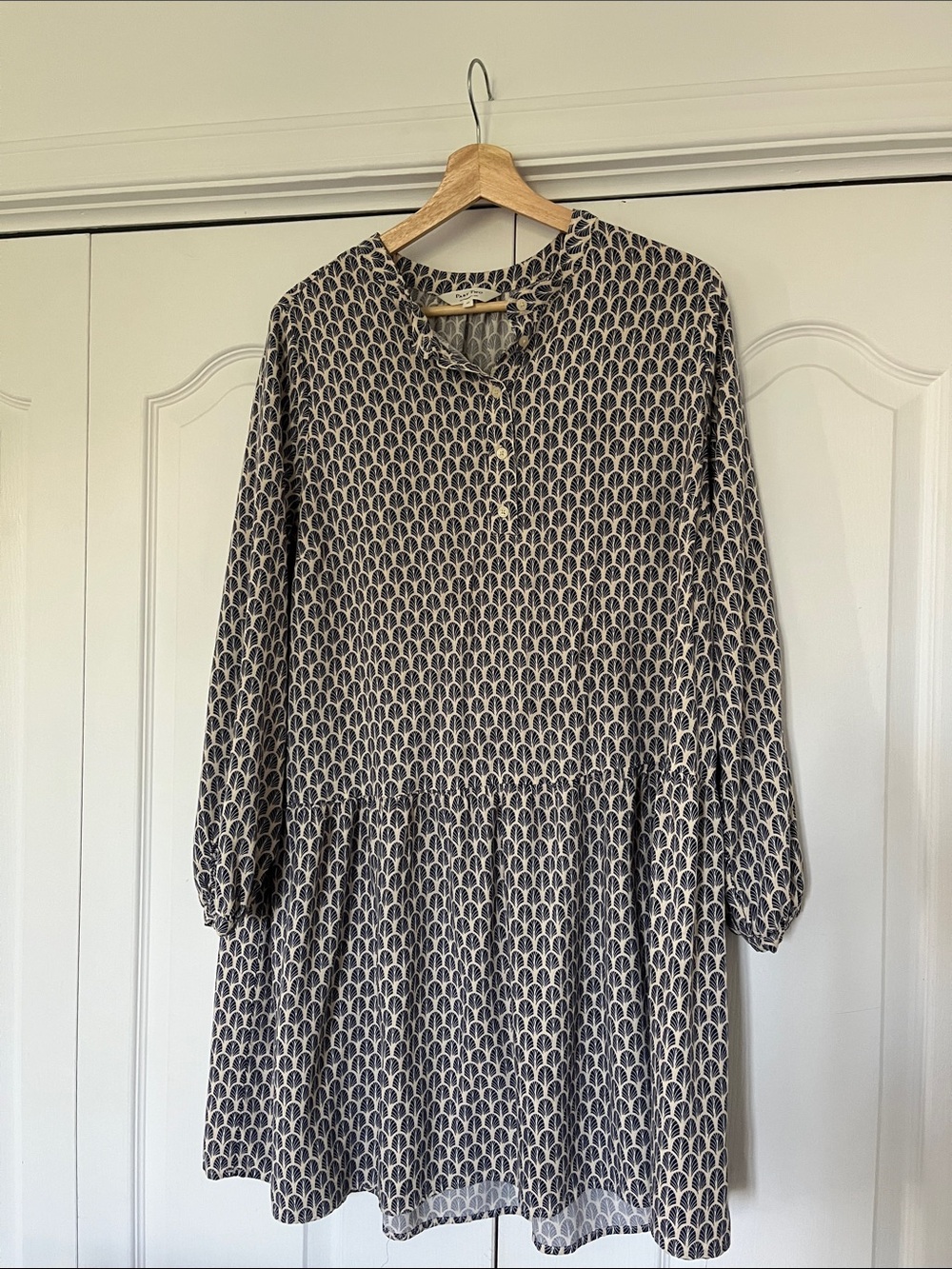 Long-Sleeve Patterned Dress in Beige and Navy.